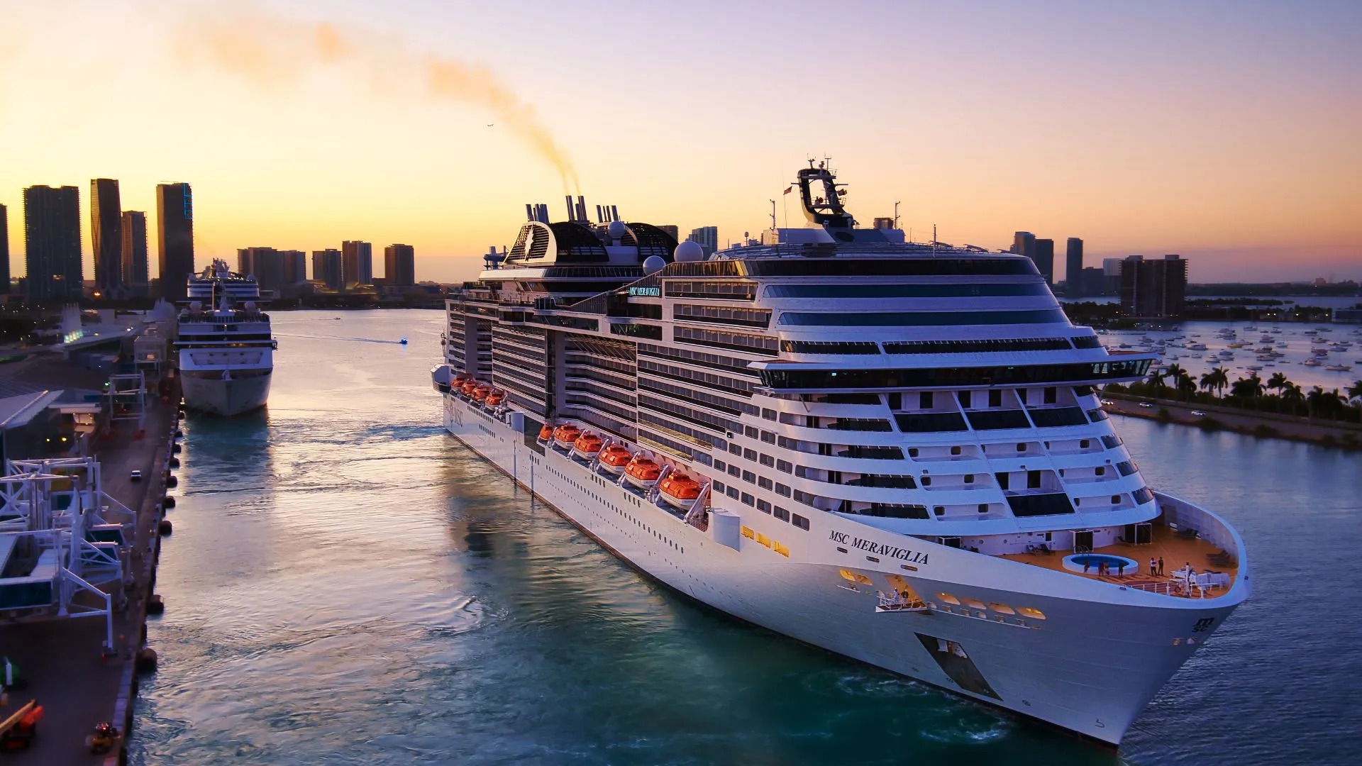 South American cruise ship leaving port at night